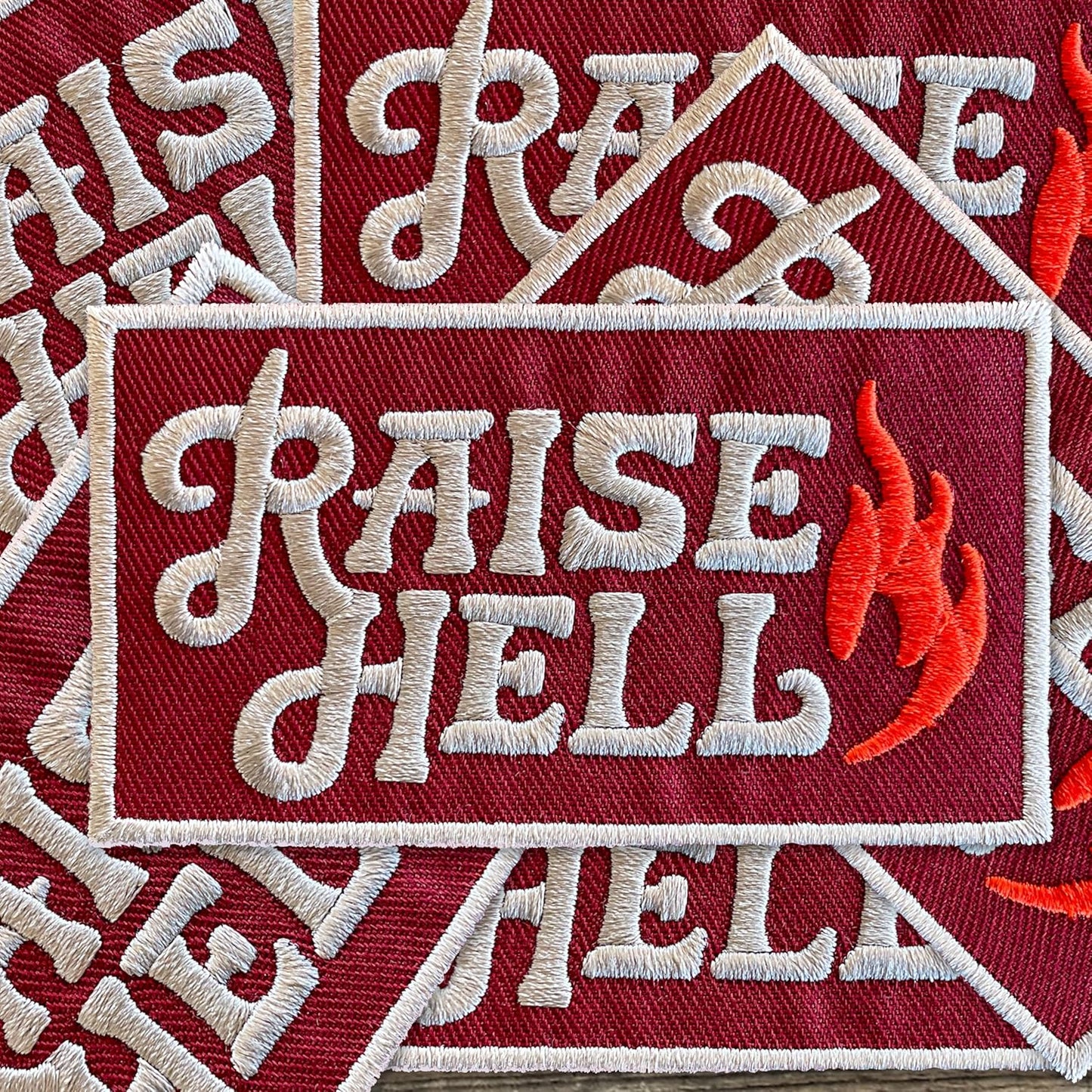 Raise Hell Embroidered Patch - Iron-On Patch For Trucker Hats & More 3.5" x 2"