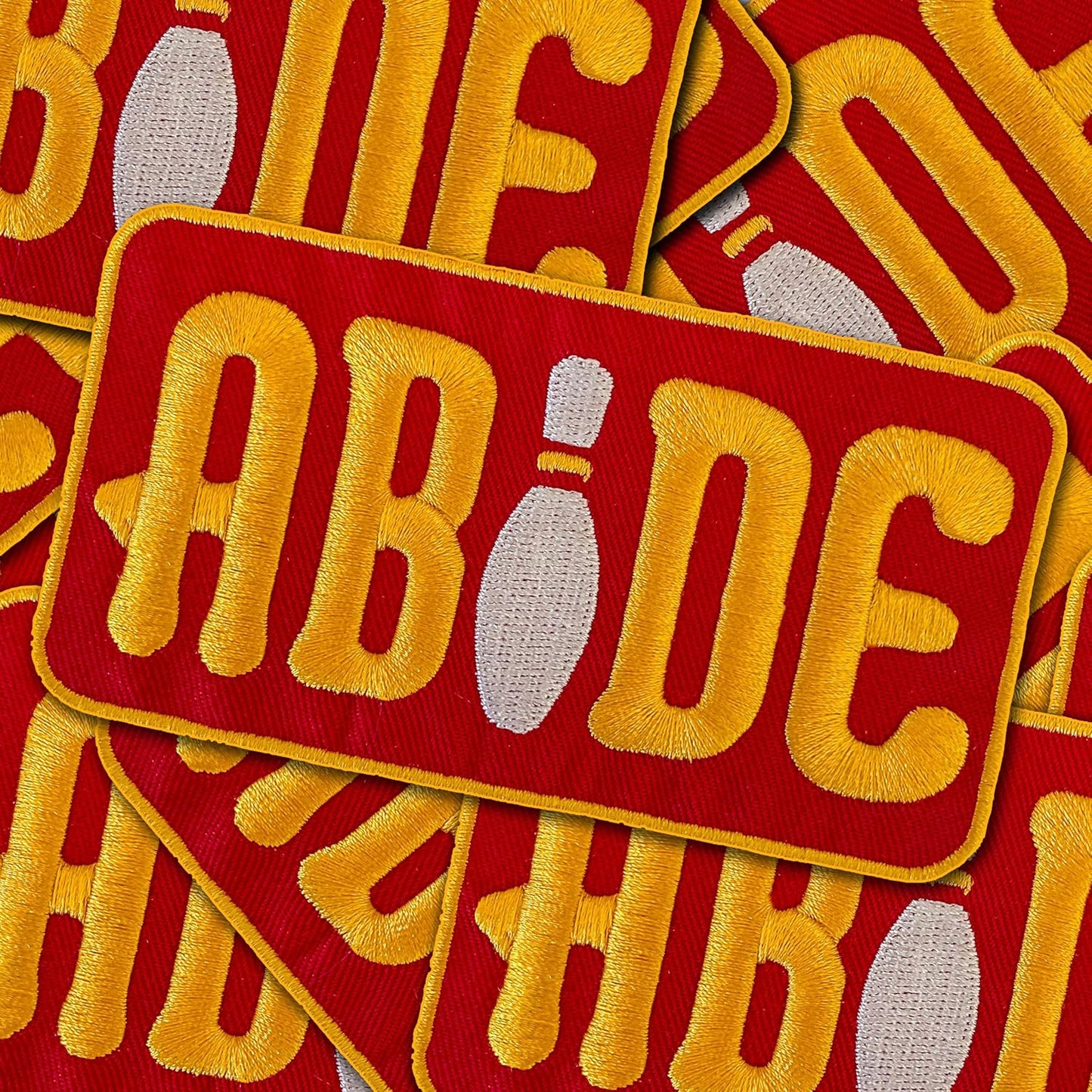 ABIDE Embroidered Bowling Pin Maroon and Golden Yellow Iron-On Patch 4" x 2" - Great for Trucker Hats NEW